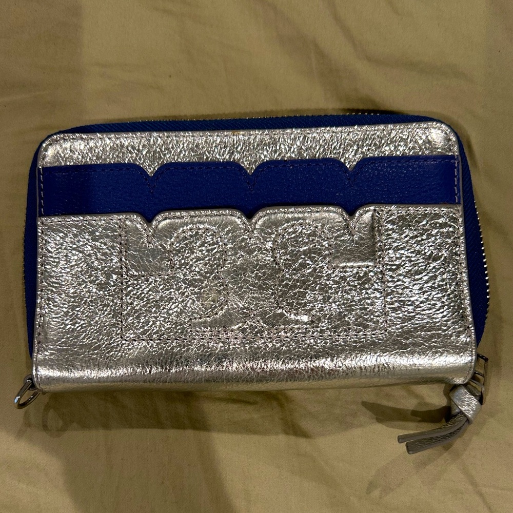 Unique metallic Tory Burch wallet with clutch strap